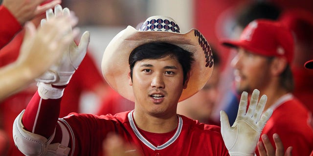 Shohei Ohtani #17 of the Los Angeles Angels celebrates his second home run of the game in the seventh inning against the Detroit Tigers at Angel Stadium of Anaheim on September 05, 2022, in Anaheim, California.