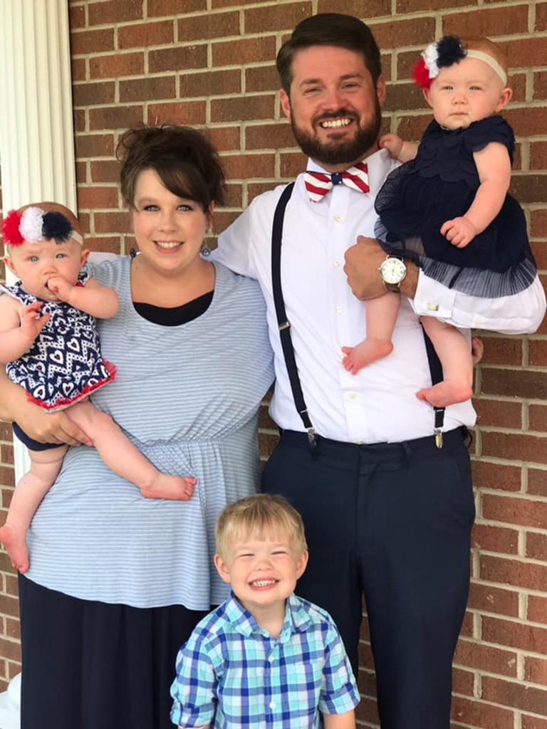 The couple are pictured with their three young children. Megan believed she would be raising the kids as a single mom after doctors delivered the devastating news about Ryan's "death."