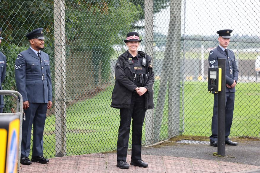 A picture of Lancaster and other officers standing outside for the Queen's funeral.