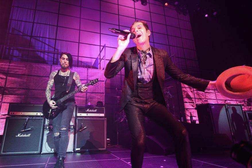 A photo of Dave Navarro and Perry Farrell performing on stage for Jane’s Addiction