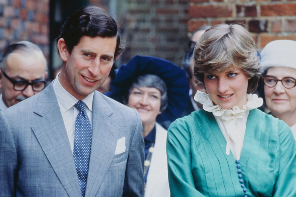 Princess Diana and Prince Charles are pictured in the early 1980s. Like Meghan, Diana had a famously fractious relationship with the royal family, but was "never anti-monarchy," according to Brown. 