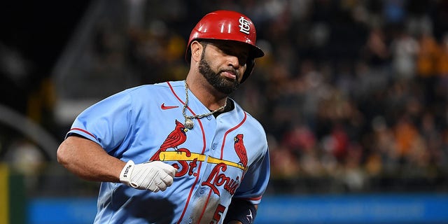 Albert Pujols #5 of the St. Louis Cardinals rounds the bases after hitting a two run home run in the sixth inning during the game against the Pittsburgh Pirates at PNC Park on September 10, 2022 in Pittsburgh, Pennsylvania. The Home Run was the 696th of Pujols Career.