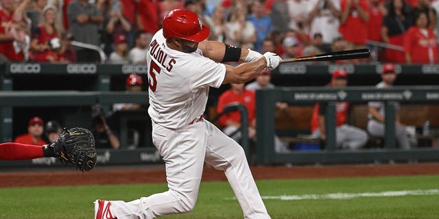 Albert Pujols of the St. Louis Cardinals hits a two-run home run against the Cincinnati Reds in the sixth inning at Busch Stadium Sept. 16, 2022, in St Louis.