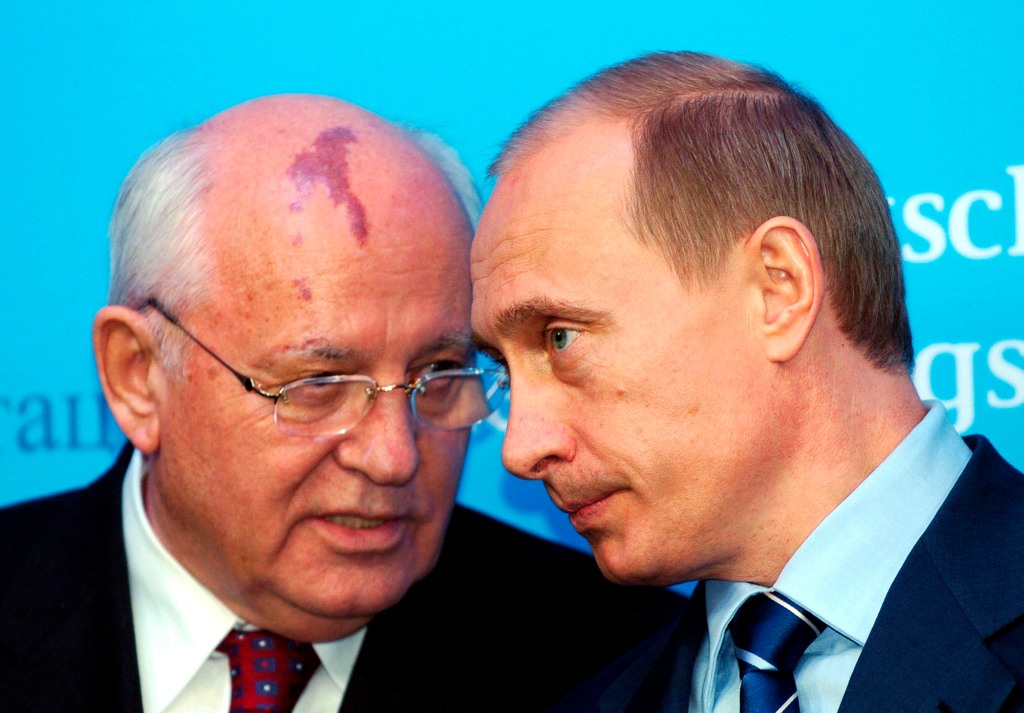 Putin, right, has blamed Gorbachev, left, for the demise of the Soviet Union.