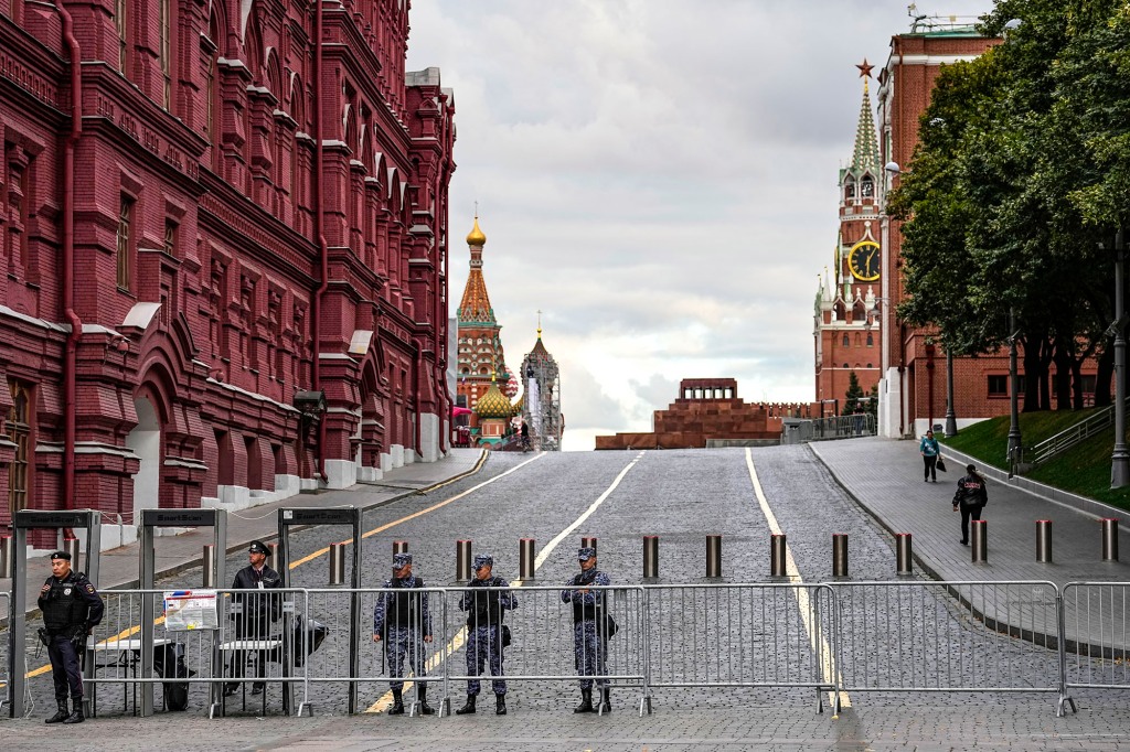 Police and the National Guard servicemen guard the entrance of Red Square, a day after Gorbachev's death on Tuesday. 
