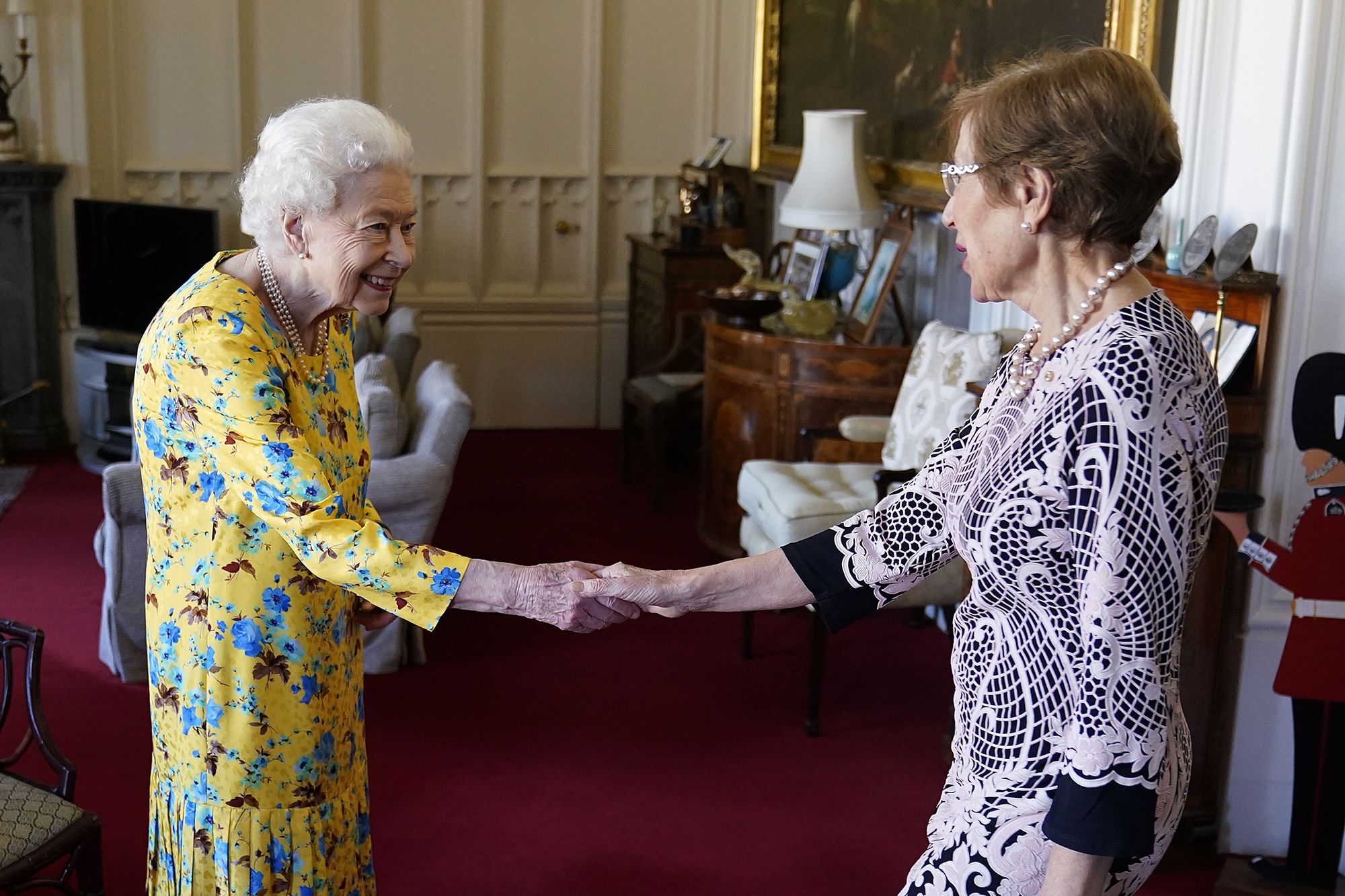 The monarch is pictured greeting New South Wales Premier Margaret Beazley at Windsor Castle this past June. 