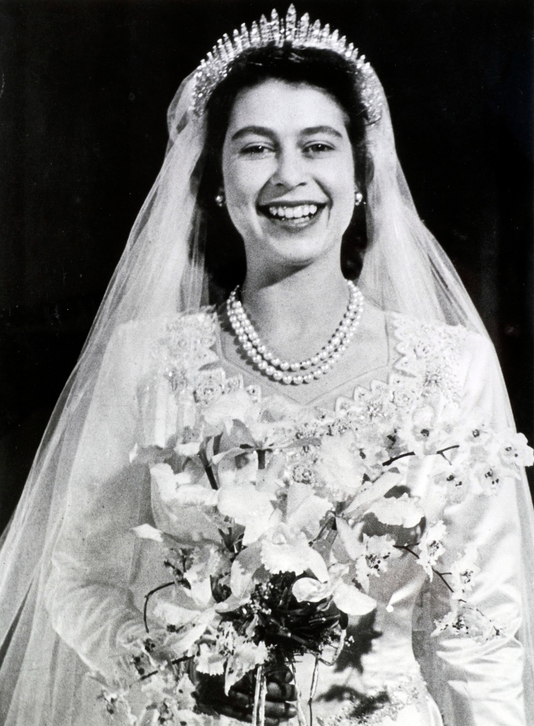 Despite her noble status, the Queen used World War II rationing coupons to purchase her wedding dress in 1947.