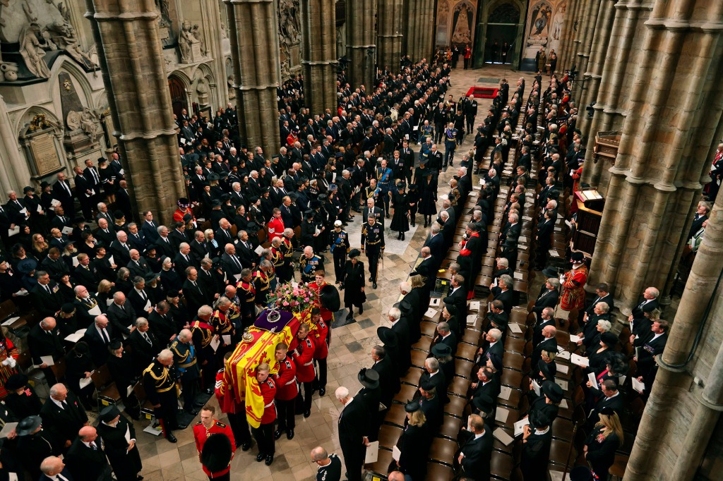 King Charles III, Camilla, Queen Consort and other members of the Royal family follow the coffin of Queen Elizabeth II as it is carried into Westminster Abbey ahead of her State Funeral, in London, Monday Sept. 19, 2022. 