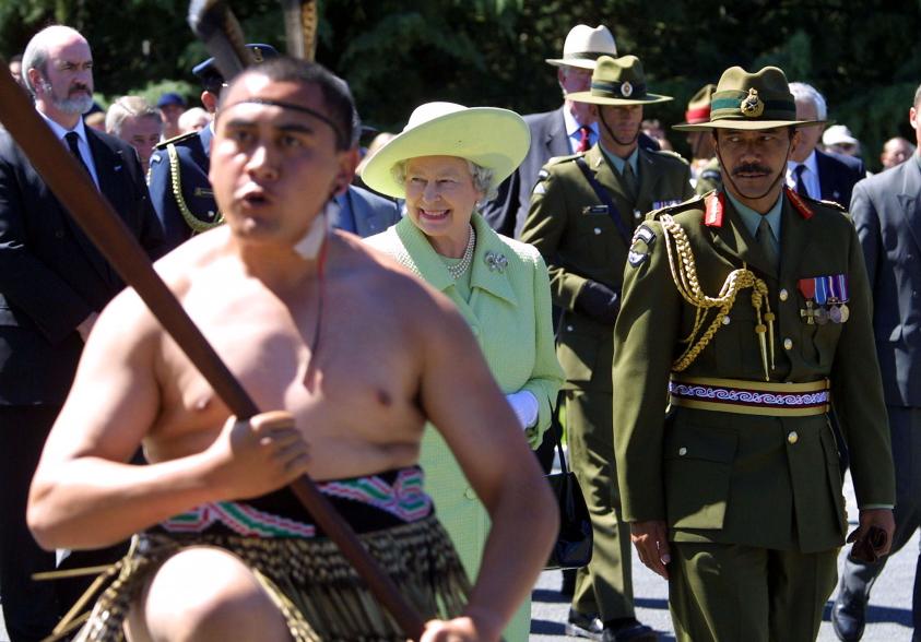 In 2002, Queen Elizabeth traveled to New Zealand’s Burnham Military Camp, where she was escorted by Colonel Martin Dransfield ONZM and a Maori warrior.