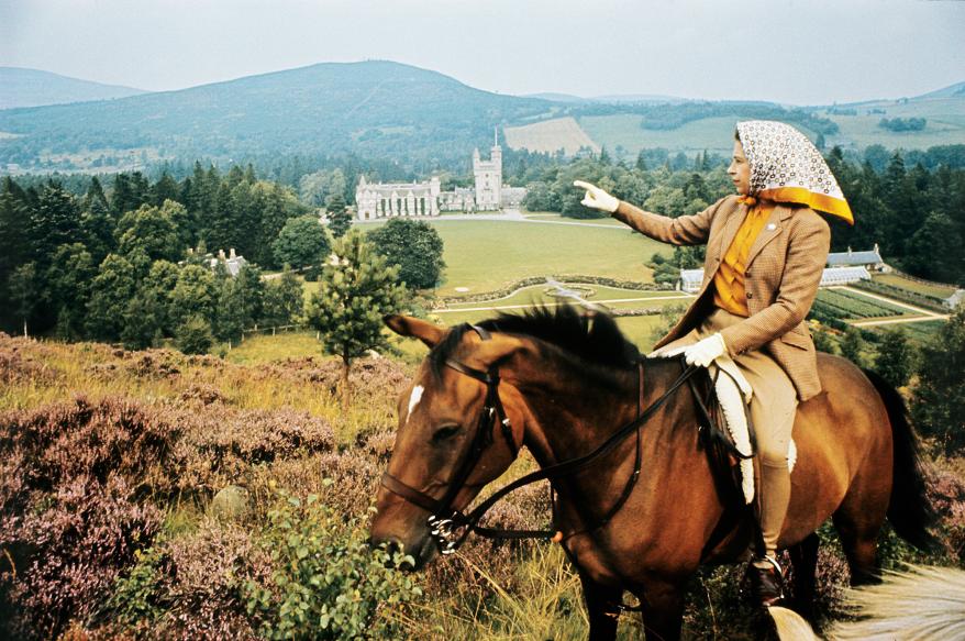 Riding horses was one of the Queen's many hobbies. Here, she is in the Scottish countryside looking down at her beloved Balmoral Castle. The photo was taken for use during the Silver Wedding Celebrations in 1972.