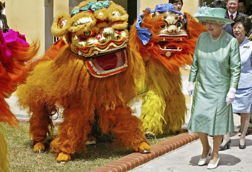 Queen Elizabeth enjoyed a dance performed by a local Singapore toop during her visit to the Toa Payoh Housing Development Board estate in 2006. It was her first trip to Singapore in nearly two decades.