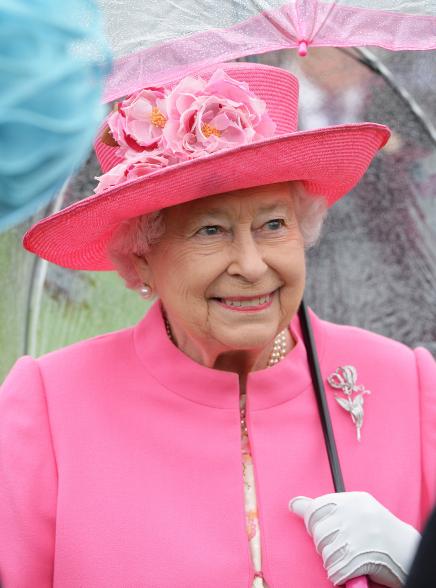 The Queen rocked a matching umbrella when she ventured out when it rain in Britain.