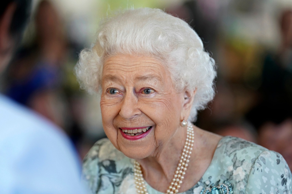 Queen Elizabeth II looks on during a visit to officially open the new building at Thames Hospice, Maidenhead, England July 15, 2022. 