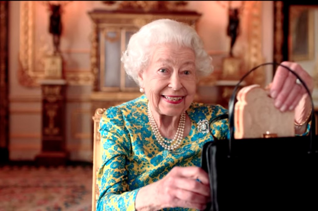 During the sketch, the Queen revealed that she too loved marmalade sandwiches ... and kept one in her trademark purse. 