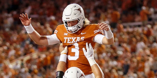 Longhorns' Quinn Ewers celebrates after a touchdown against the Louisiana Monroe Warhawks on Sept. 3, 2022, in Austin, Texas.