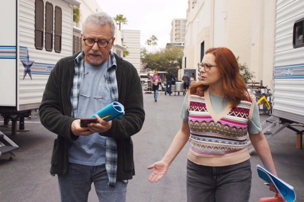 Gordon (Paul Reiser), and Hannah (Rachel Bloom) walk next to each other on "Reboot." 
