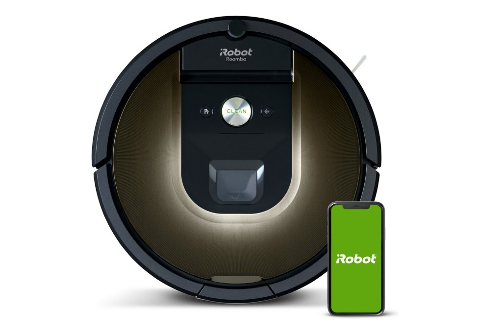 a brown and black iRobot Roomba vacuum