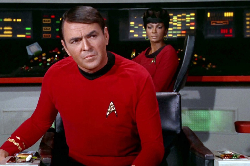 James Doohan as Montgomery "Scotty" Scott on the bridge with Nichelle Nichols as Uhura in the STAR TREK episode, "A Piece of the Action."