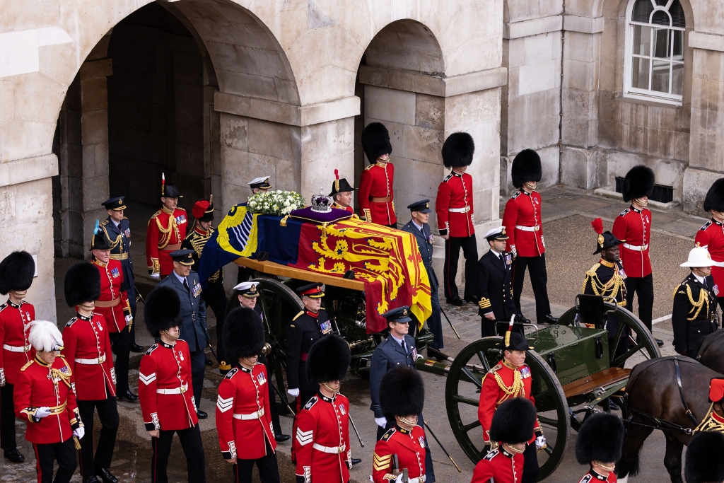 Her Majesty Queen Elizabeth II's coffin is carried on a gun carriage from Buckingham Palace to Westminster Hall in London on Wednesday, September 14, 2022, where her body lay in state for four days.