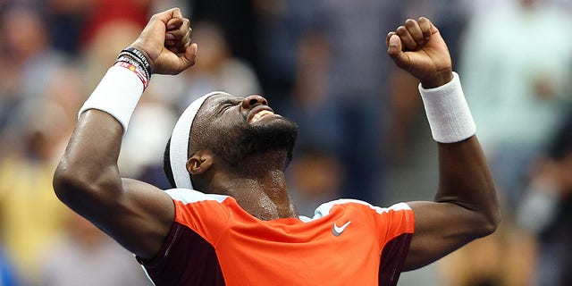 Frances Tiafoe of the United States celebrates after defeating Andrey Rublev during their quarterfinal match at the U.S. Open in New York on Sept. 7, 2022.