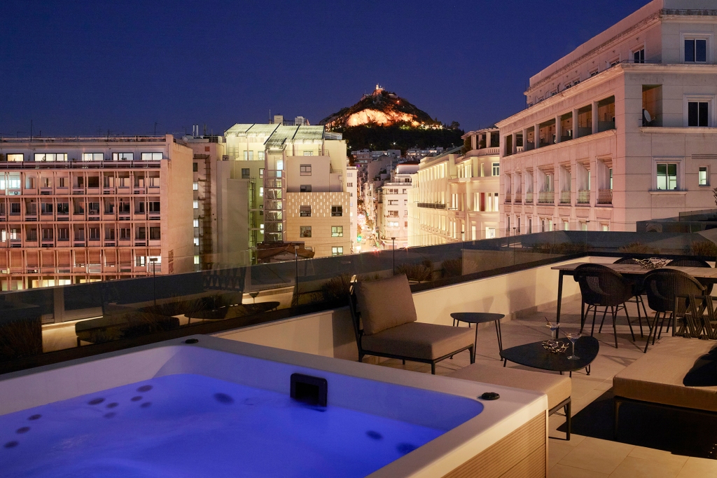 Rooftop pool view from the Xenodocheio Milos hotel.