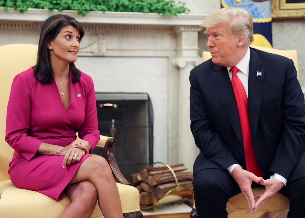 According to a new book, Donald Trump, right, refused to name Haley, left, a secretary of state because of her "complexion problem." 