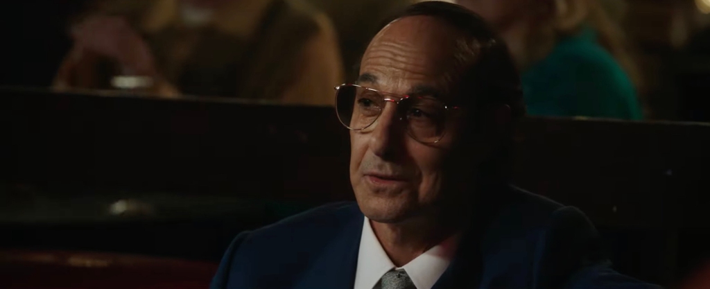 Stanley Tucci portrays legendary record producer Clive Davis in the film.