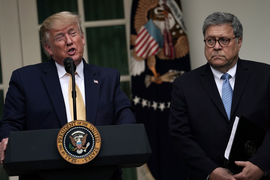 Former President Donald Trump makes a statement on the census with ex-Attorney General William Barr in the Rose Garden in July 2019.