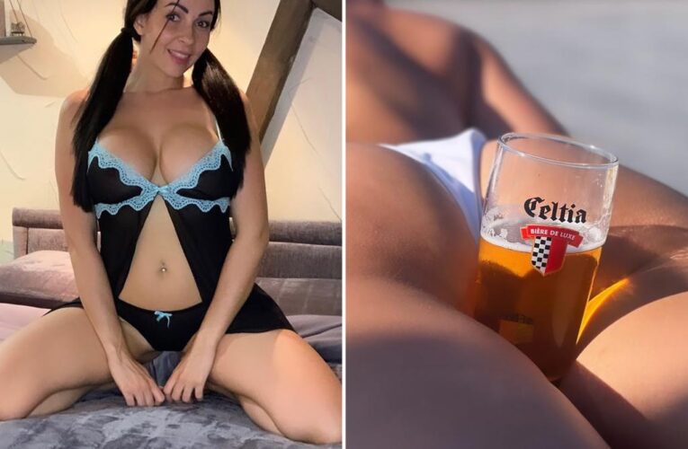 Small businesswoman sells sexy photos online to save her bar