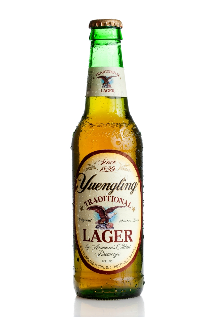 A bottle of Yuengling on a white background.