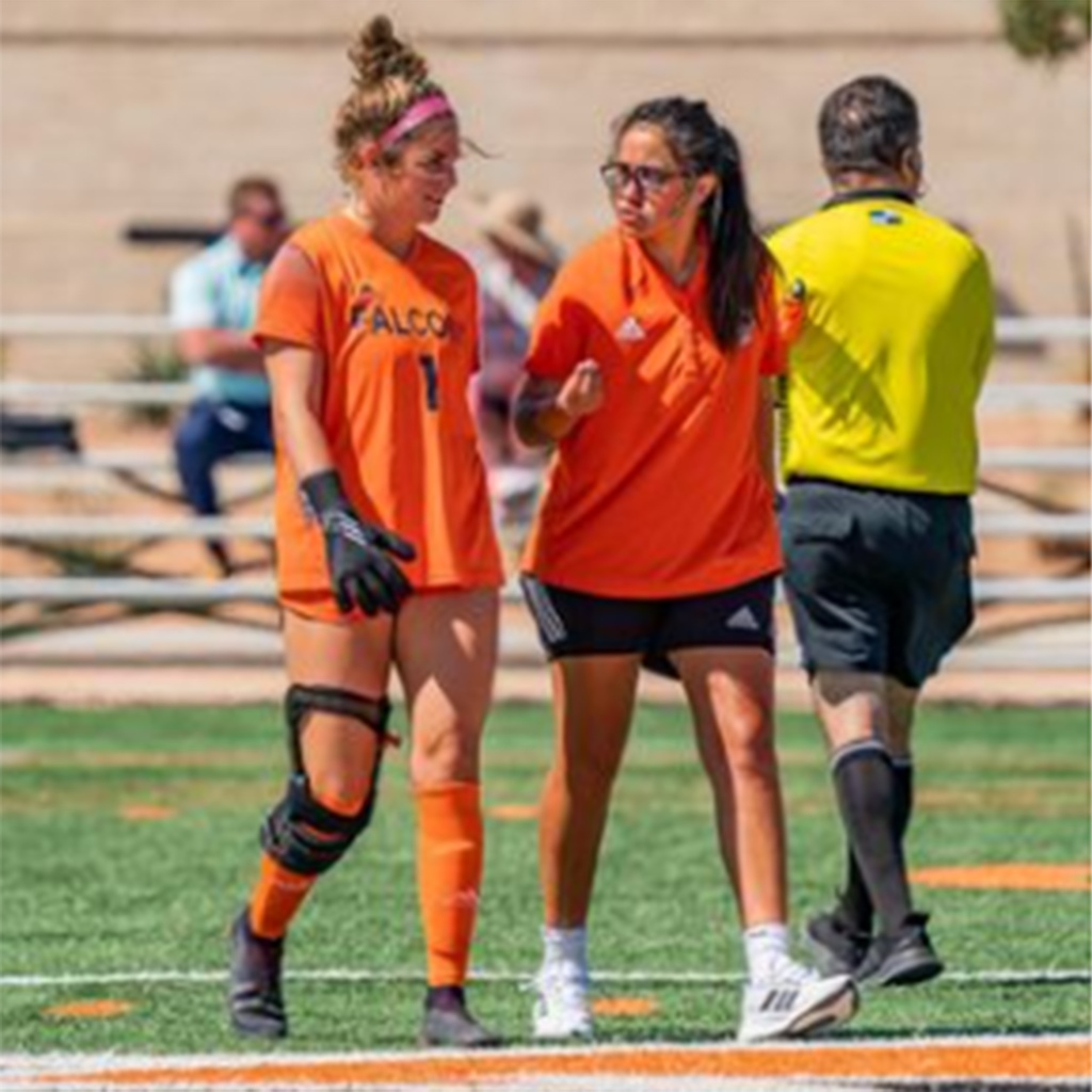 Carla Tejas, the women’s soccer head coach of the University of Texas Permian Basin in orange jersey