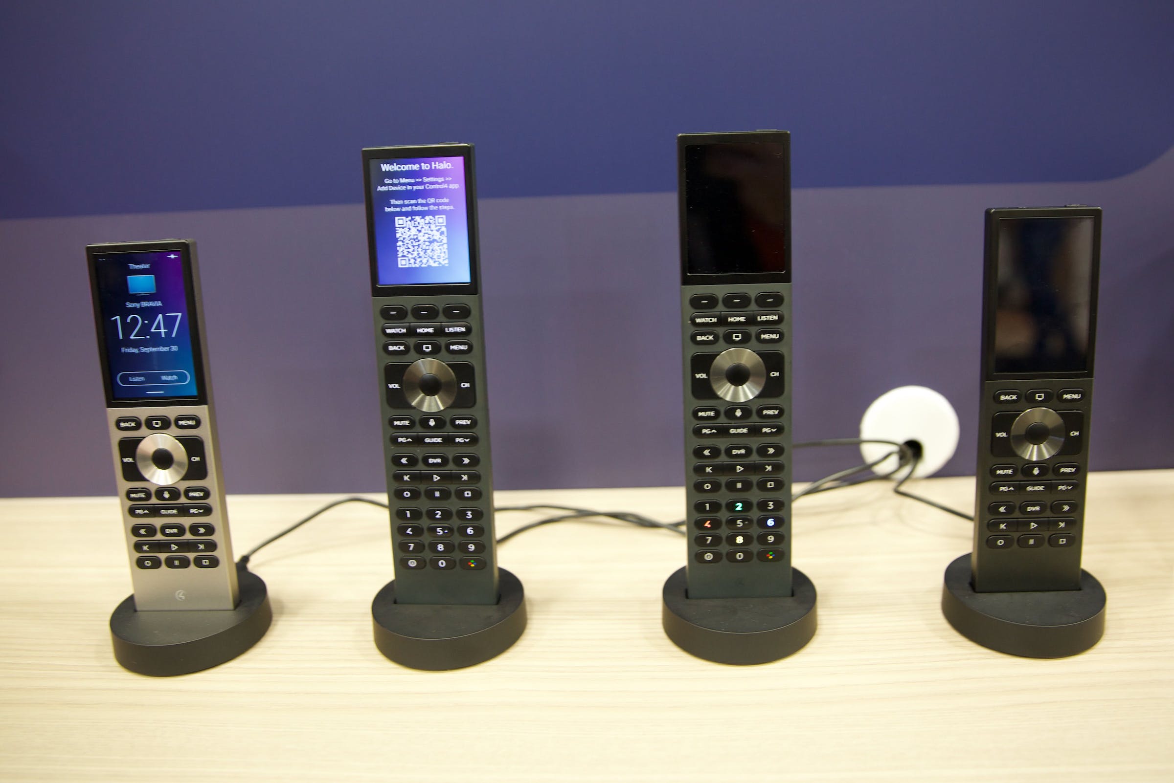 A selection of remotes for the professionally-installed smart home displayed on the CEDIA Expo 2022 show floor.