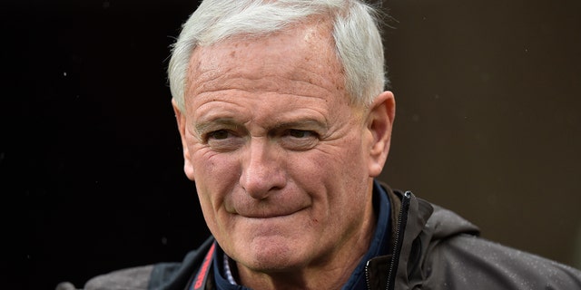 Cleveland Browns owner Jimmy Haslam watches players warm up for an NFL game against the Detroit Lions in Cleveland, Ohio, on Nov. 21, 2021.