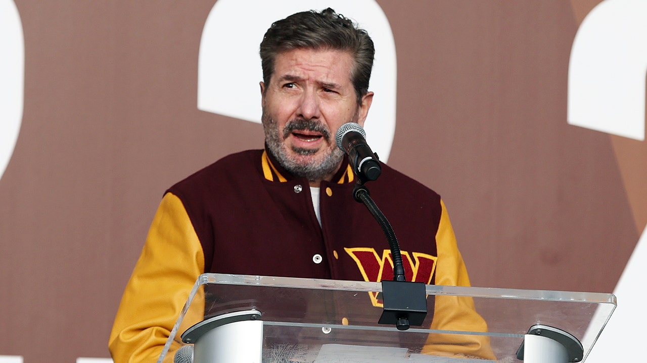 Dan Snyder speaks during name change presser