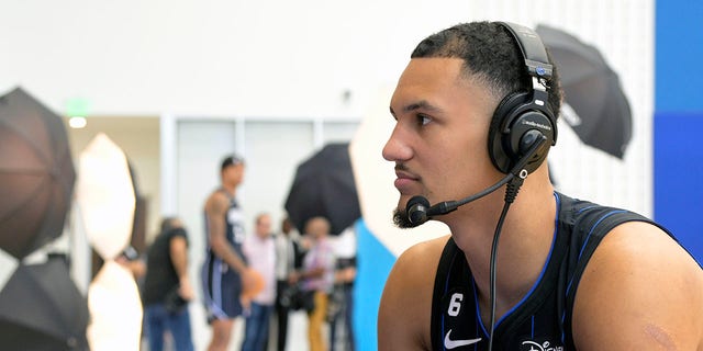 Orlando Magic guard Jalen Suggs sits for an interview during the team's media day on Sept. 26, 2022, in Orlando, Florida.