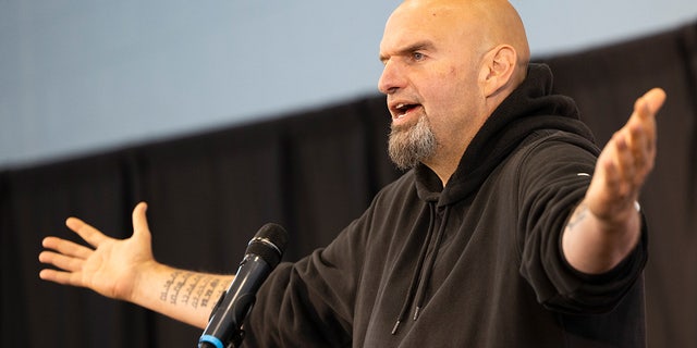 Pennsylvania Lt. Gov. John Fetterman, Democratic candidate for U.S. Senate, accompanied by Rep. Dwight Evans, D-Pa., speaks in Philadelphia, Saturday, Sept. 24, 2022.