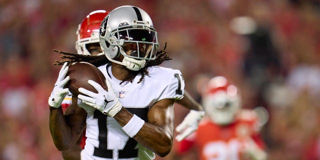 Davante Adams, #17 of the Las Vegas Raiders, catches a touchdown pass against the Kansas City Chiefs during the first half at GEHA Field at Arrowhead Stadium on Oct. 10, 2022 in Kansas City, Missouri. 