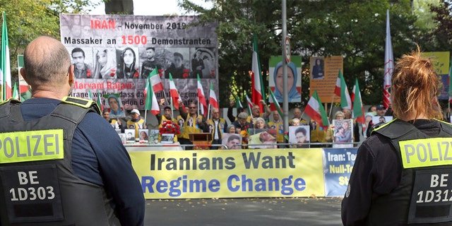 People who followed the call of the German-Iranian Society in Berlin demonstrate in front of the Iranian embassy against the so-called "moral police" in their home country, in Berlin, Germany, Friday, Sept. 23, 2022. 