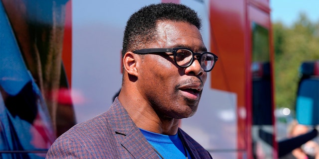 Georgia Republican Senate nominee Herschel Walker speaks during a campaign stop at Battle Lumber Co. on Thursday, Oct. 6, 2022, in Wadley, Georgia.