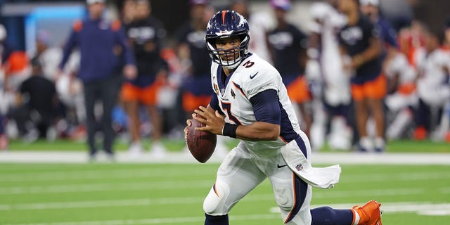 Russell Wilson #3 of the Denver Broncos looks to pass during the first half against the Los Angeles Chargers at SoFi Stadium on October 17, 2022 in Inglewood, California.