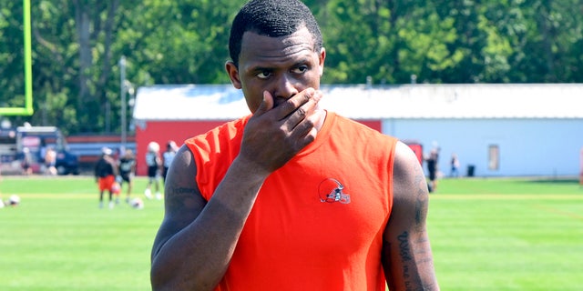 Cleveland Browns quarterback Deshaun Watson walks off the field after training camp Aug. 3, 2022, in Berea, Ohio.