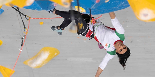 Iranian athlete Elnaz Rekabi competes during the women's Boulder Lead final during the IFSC Climbing Asian Championships, in Seoul, Sunday, Oct. 16, 2022.