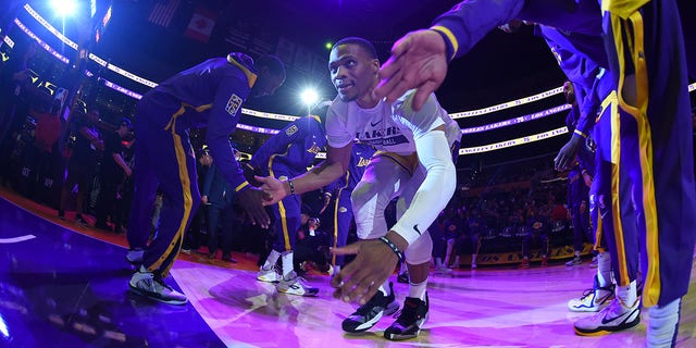 Russell Westbrook, #0 of the Los Angeles Lakers, runs onto the court before the game against the Minnesota Timberwolves on Oct. 12, 2022 at Crypto.com Arena in Los Angeles.