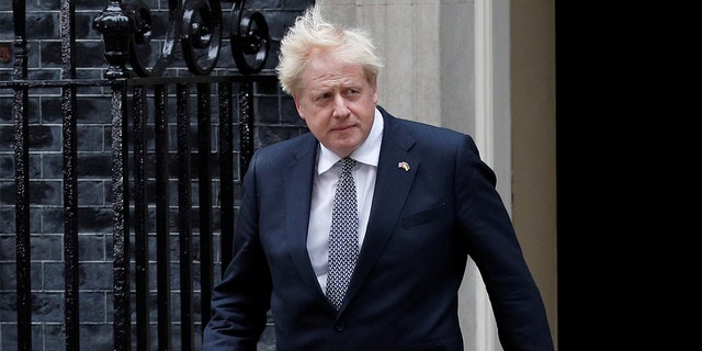 British Prime Minister Boris Johnson arrives to make a statement at Downing Street in London, July 7, 2022. 