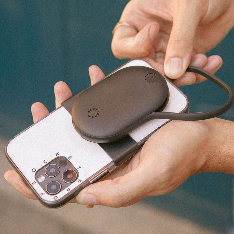 Image of a phone with a PopGrip JumpStart attached to the back.