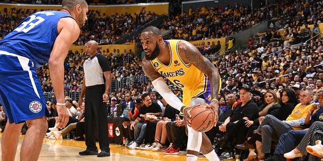 LeBron James (6) of the Los Angeles Lakers dribbles the ball during a game against the LA Clippers Oct. 20, 2022, at Crypto.com Arena in Los Angeles. 