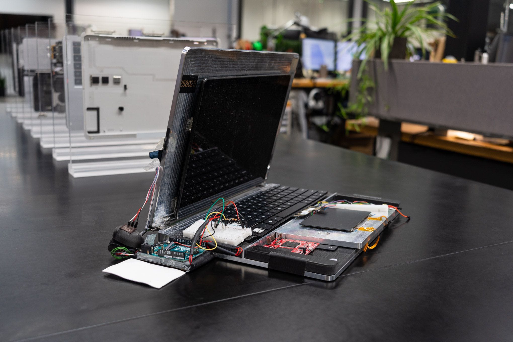 A prototype of the Surface Studio Laptop with a Surface Pro and new keyboard and trackpad all taped together.