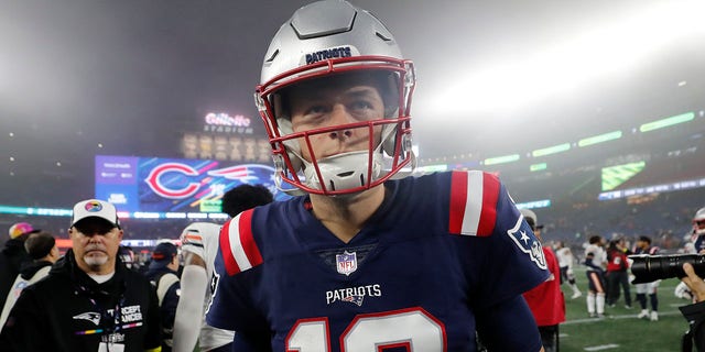 New England Patriots quarterback Mac Jones walks off the field after a 33-14 loss to the Chicago Bears on Oct. 24, 2022, in Foxborough, Massachusetts.