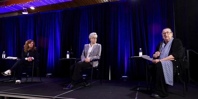 Republican nominee Christine Drazan, left, and Democratic nominee Tina Kotek, middle, listen to unaffiliated candidate Betsy Johnson speak during the gubernatorial debate hosted by Oregon Newspaper Publishers Association at Mount Hood Oregon Resort in Welches, Ore., Friday, July 29, 2022.