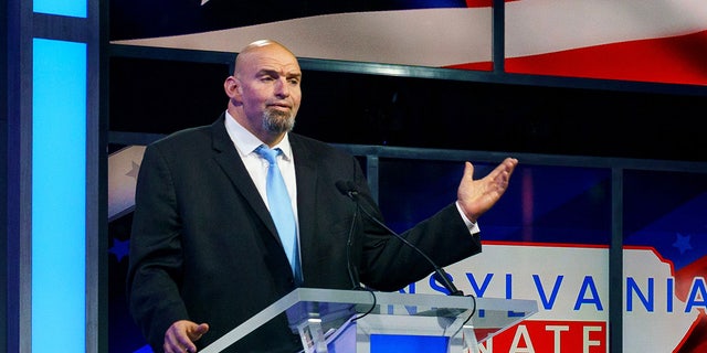 Democratic Senate candidate John Fetterman participates in a debate with his GOP challenger Dr. Mehmet Oz on Oct. 25, 2022, in Harrisburg, Pennsylvania.